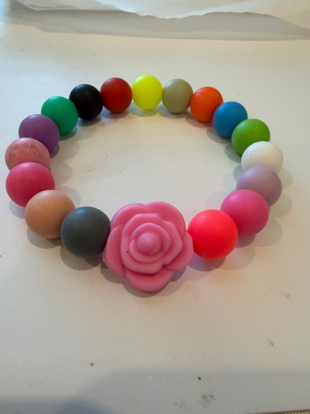 Hand Crafted Multicolor Beaded Bracelet with Pink Rose Accent